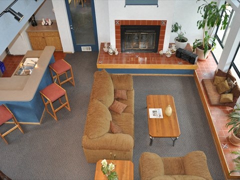 Office are with seating and fireplace