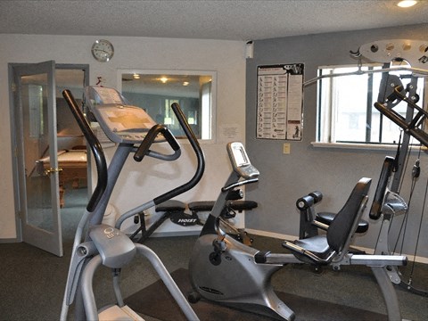 Fitness room with cardio equipment 
