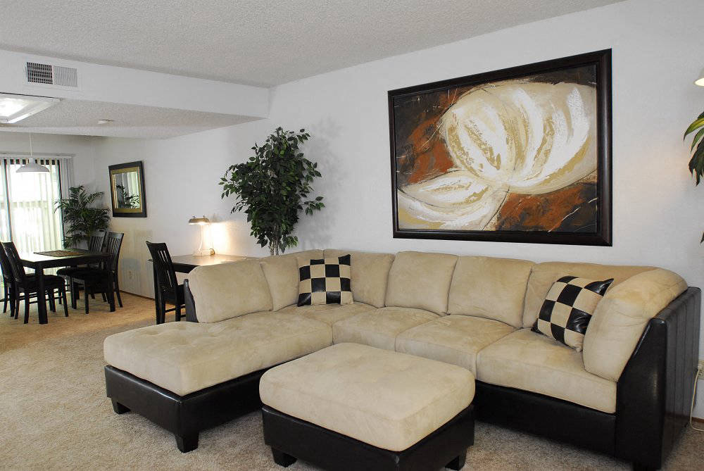 living room with view to dining  l Pepperwood Apartments in Davis CA