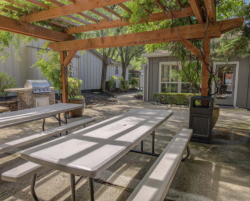 Citrus Heights, CA Apartments for Rent - Foxborough - Community BBQ Area with Two Picnic Tables under a Pergola