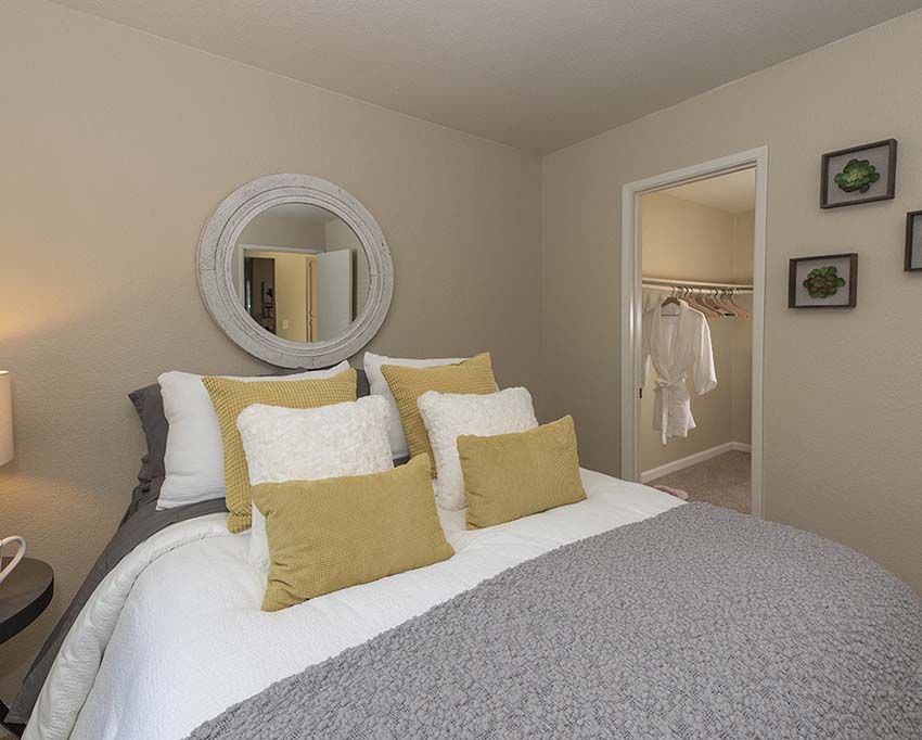 Bedroom with closet l Foxborough Apartments