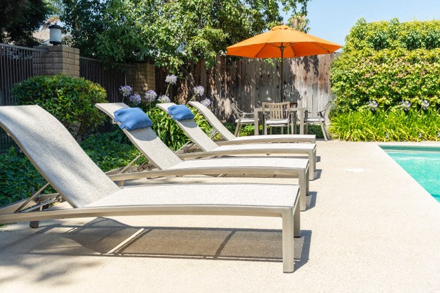 Pool Chairs at Walnut Woods Apartments in Turlock