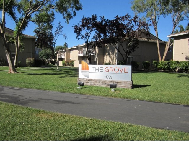 Entry Sign l The Grove Apartments in Davis CA