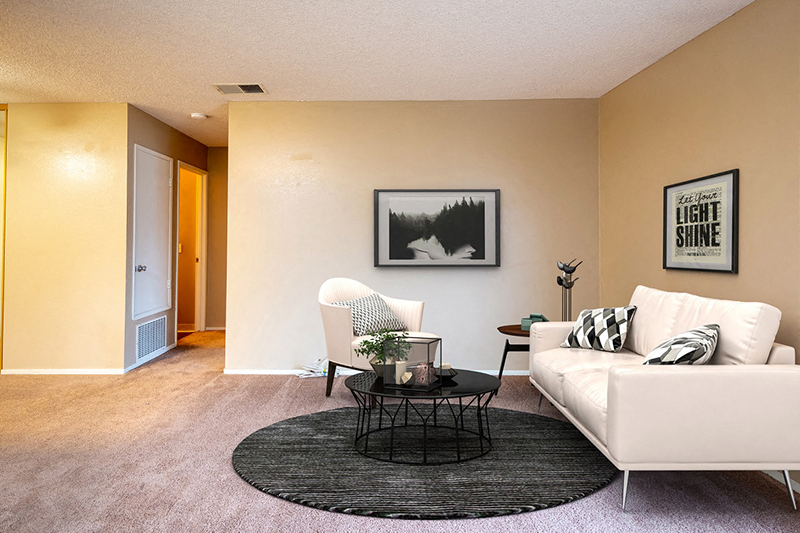 a living room with a couch and a coffee table