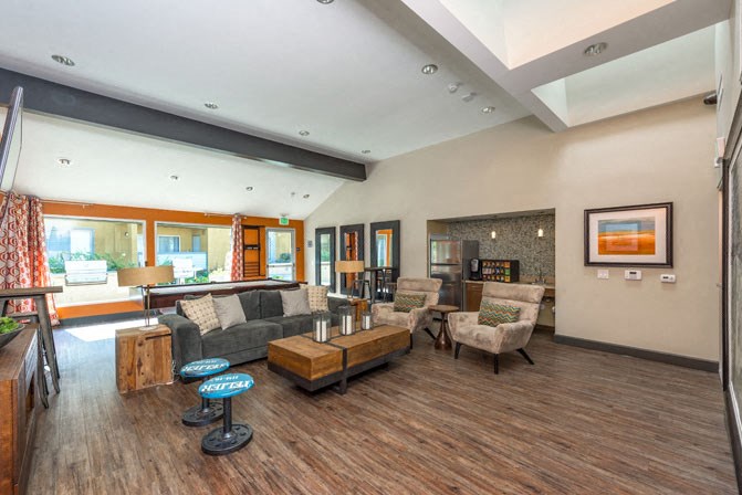 a living room with a couch and a table