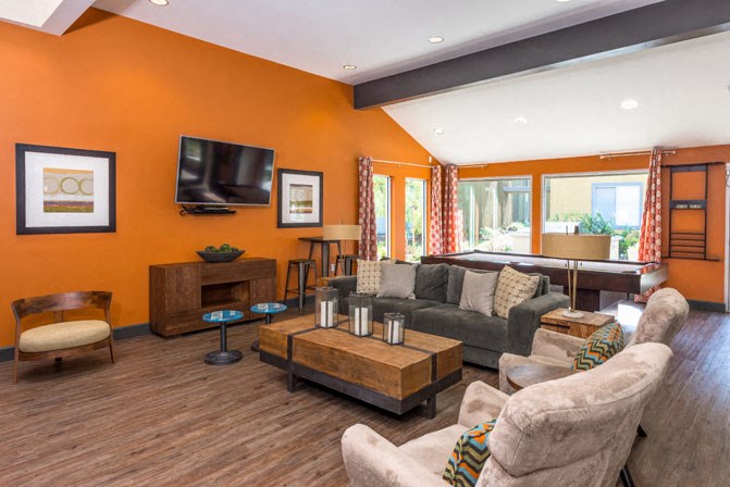 a living room with a couch and a television