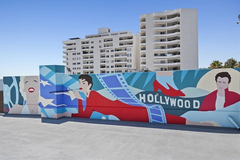 a large hollywood mural on the side of a building