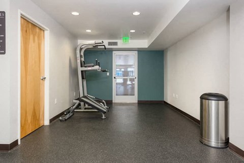 a workout room in a building with a gym equipment