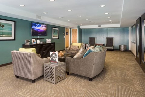 a living room with couches and a television