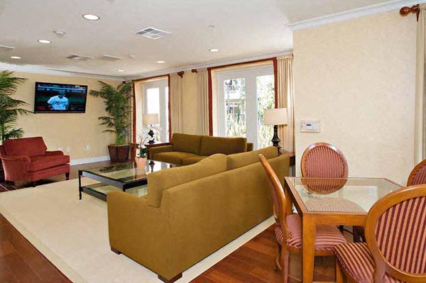 a living room with a couch and a table