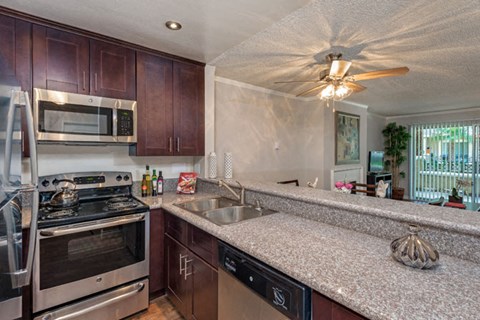 a kitchen with a counter top and a sink