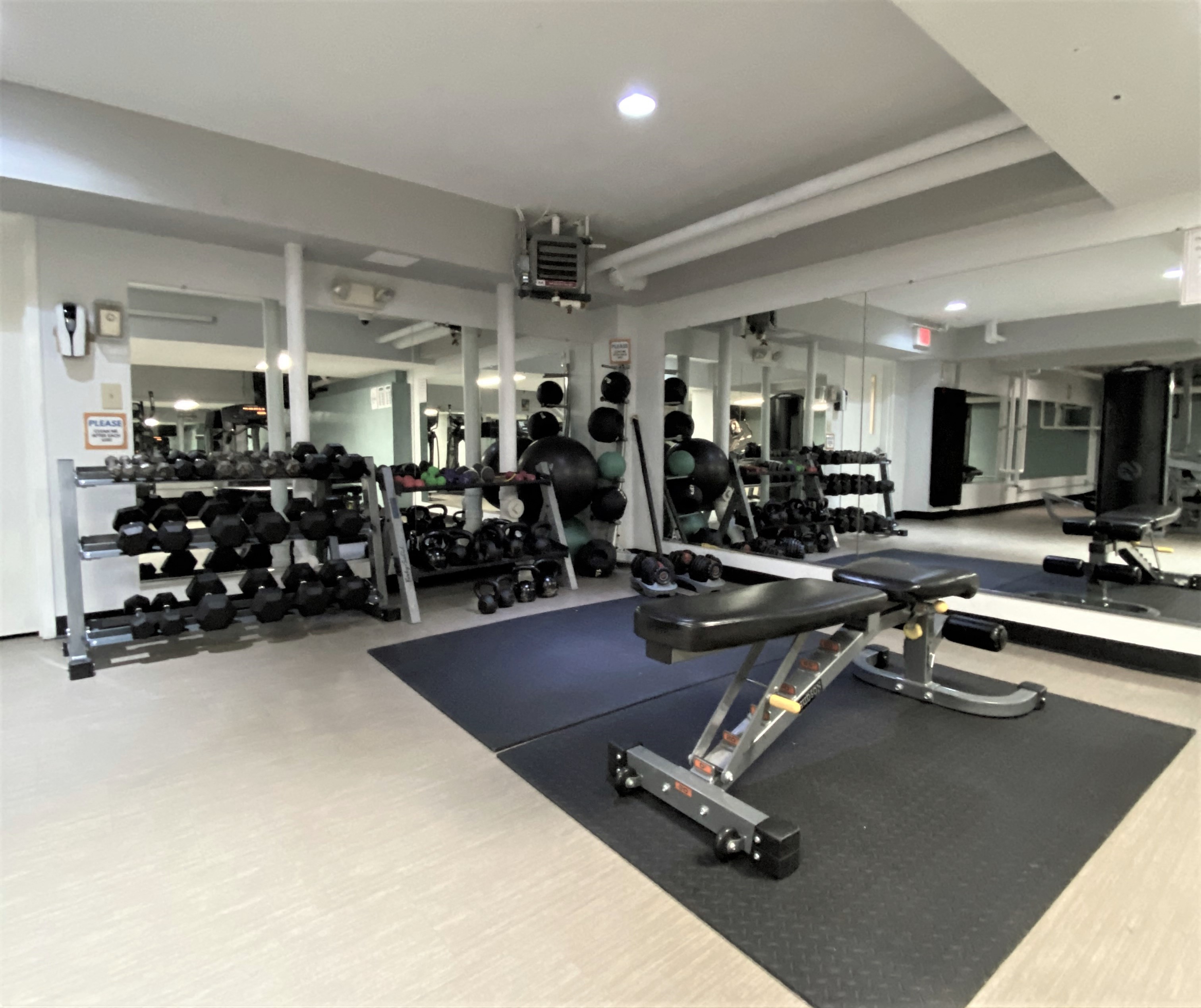 a gym with weights and other exercise equipment