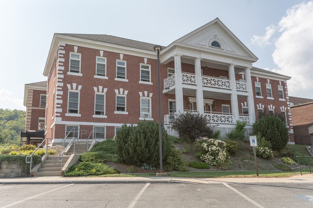 a building on the corner of a street