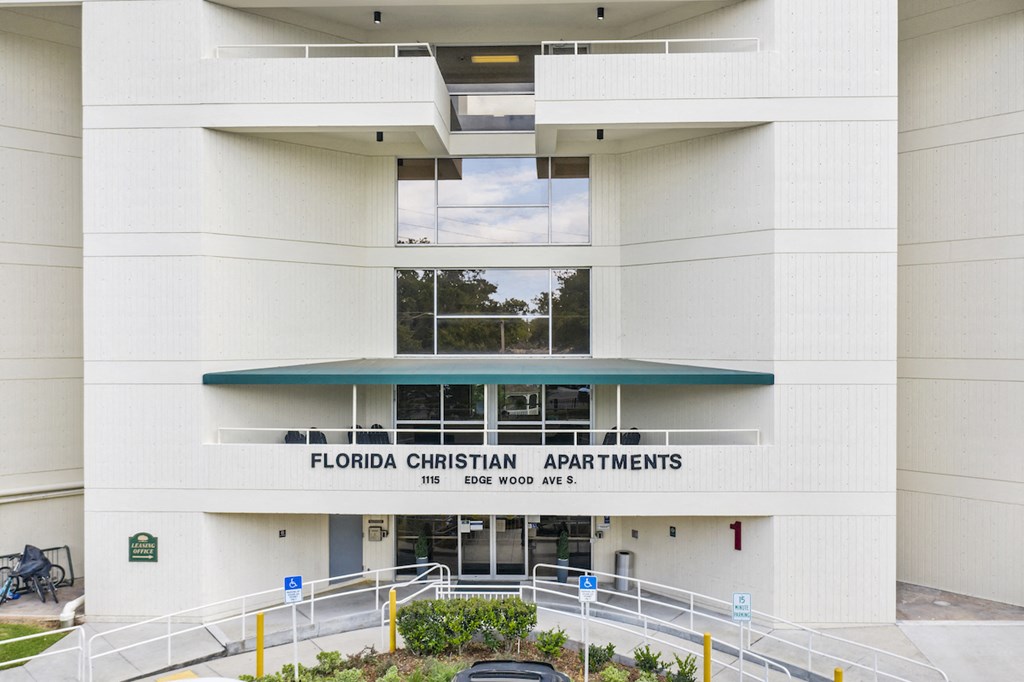 the front of the apartments building