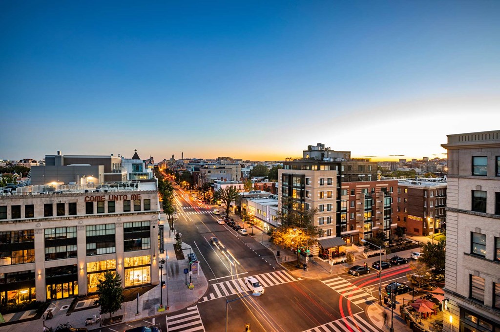 an aerial view of a city street at night