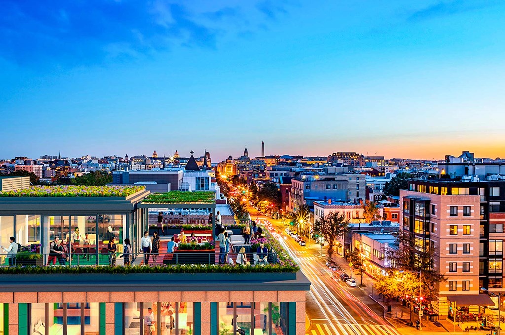 a city at night with the city skyline in the background