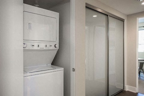 A white oven and dishwasher in a modern kitchen.