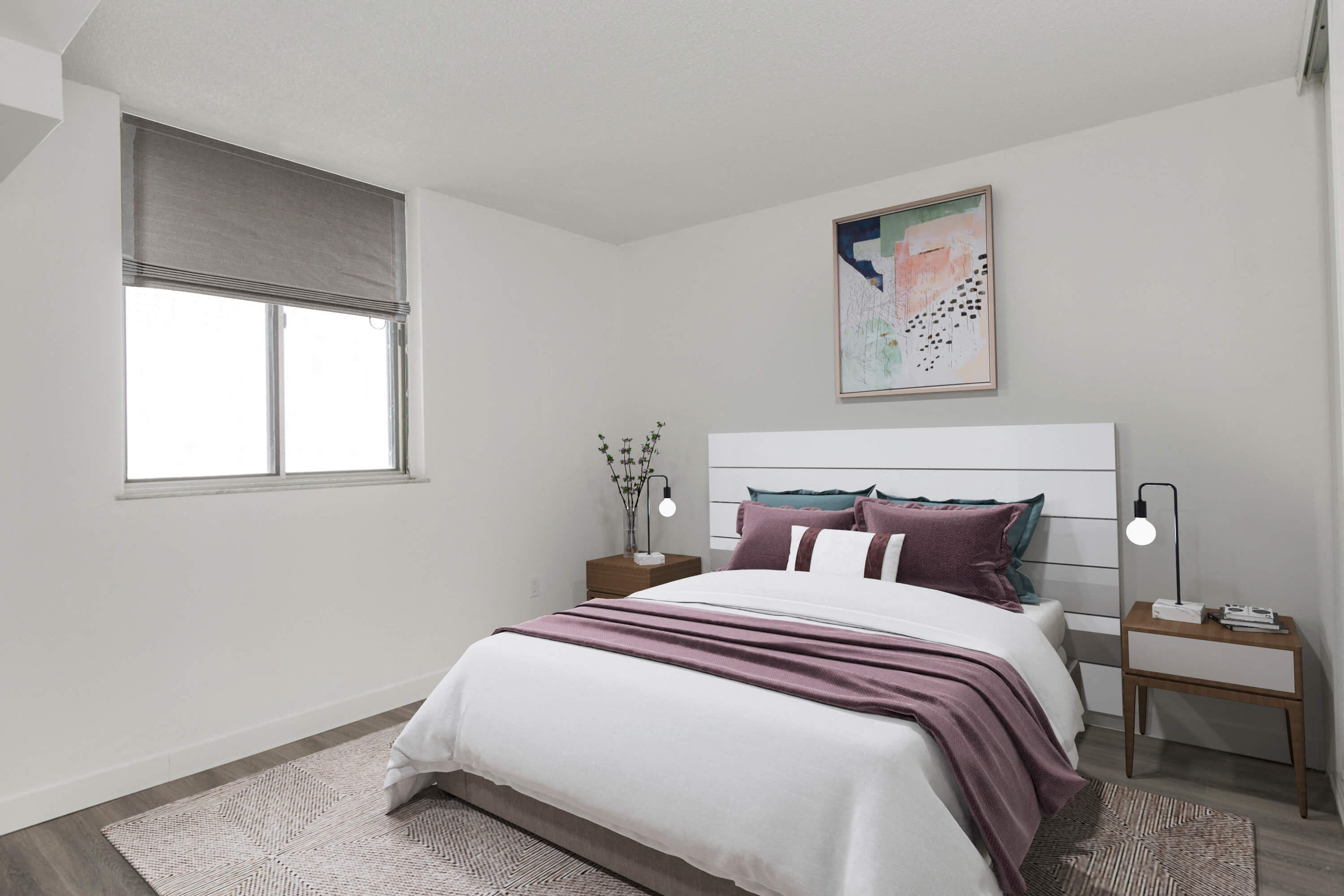 A bedroom with a large bed and a painting above it.