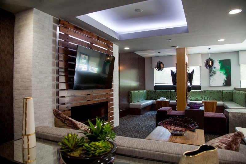 a living room with couches and a television