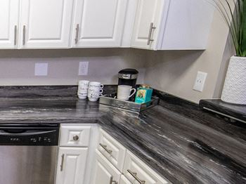 sleek granite-style countertops in modern kitchen