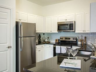 Model kitchen at Heritage on the Merrimack Apartments in Bedford NH