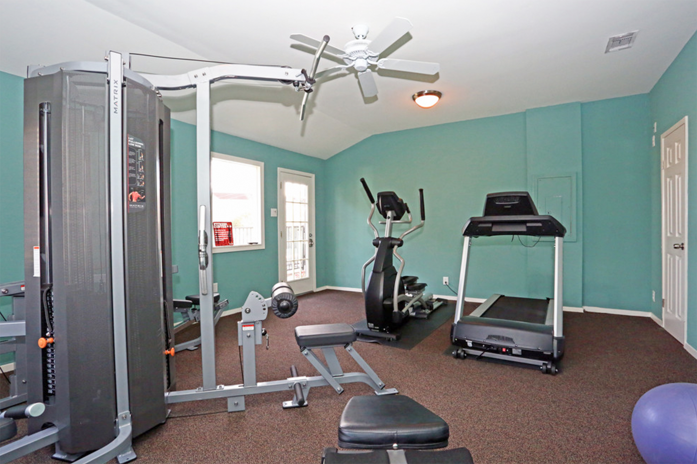 Fitness center with treadmill, weight