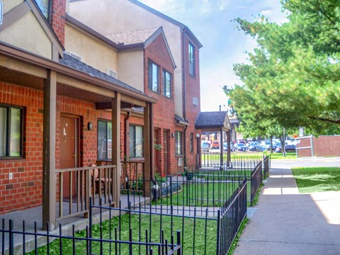 Building exterior with fenced in front yards