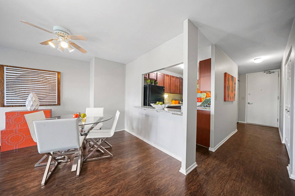 Dining area with table and chairs at 7251 at Waters Edge, Chicago, IL