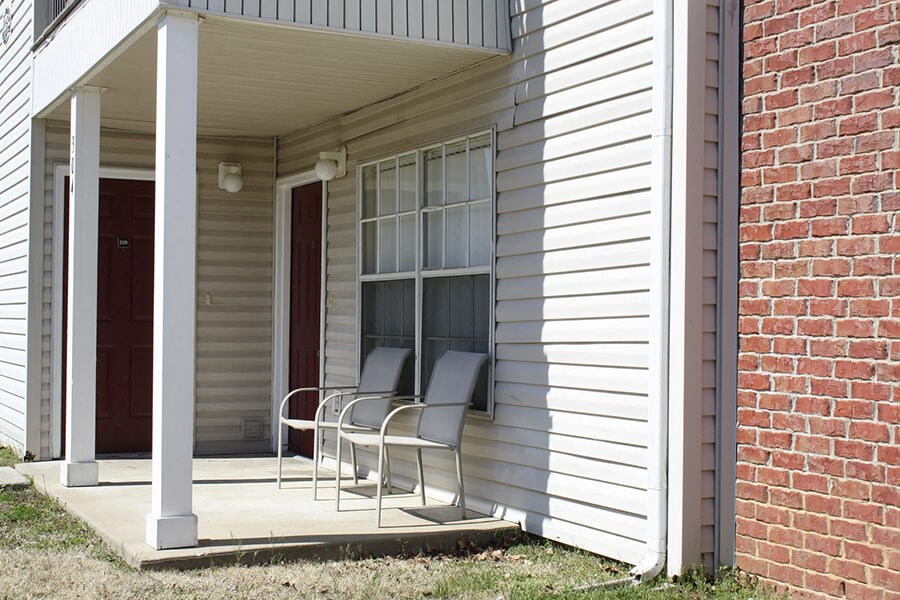 Apartment patio with chairs at Cobblestone Corners Apartment Homes, Nashville, TN
