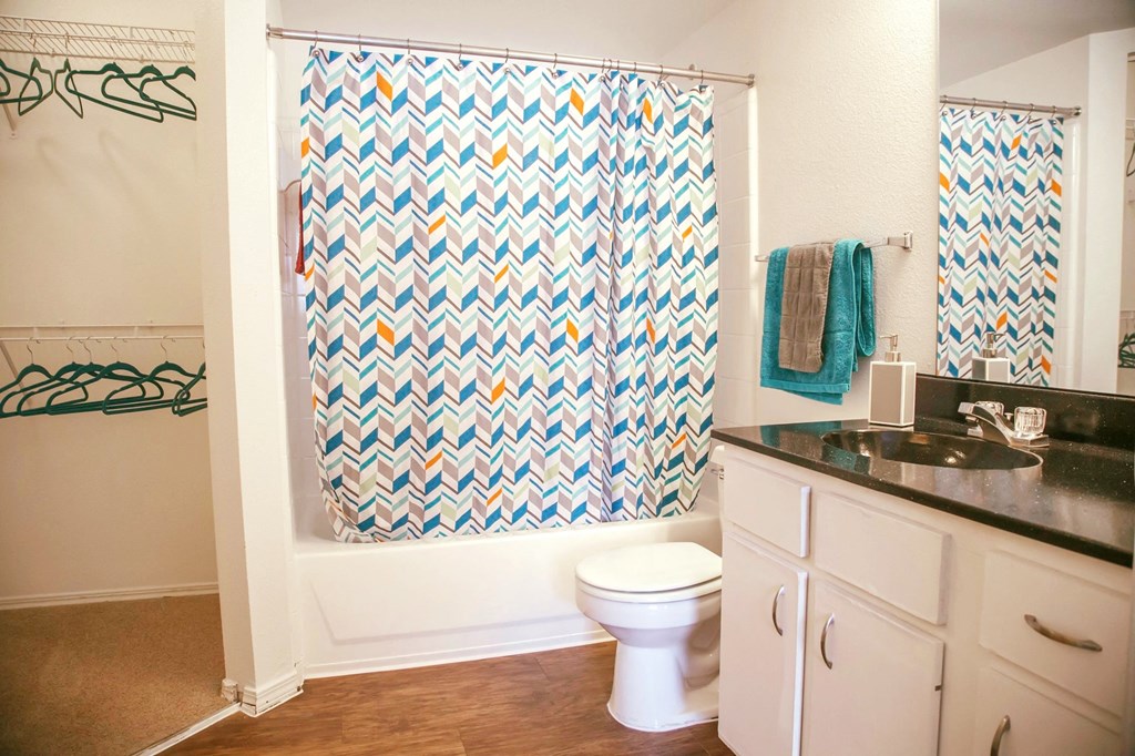 Bathroom with tub and shower
