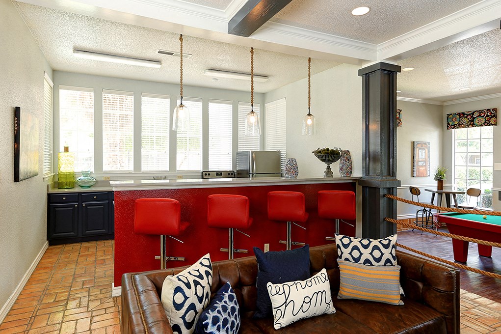 Kitchen with barstools in clubhouse