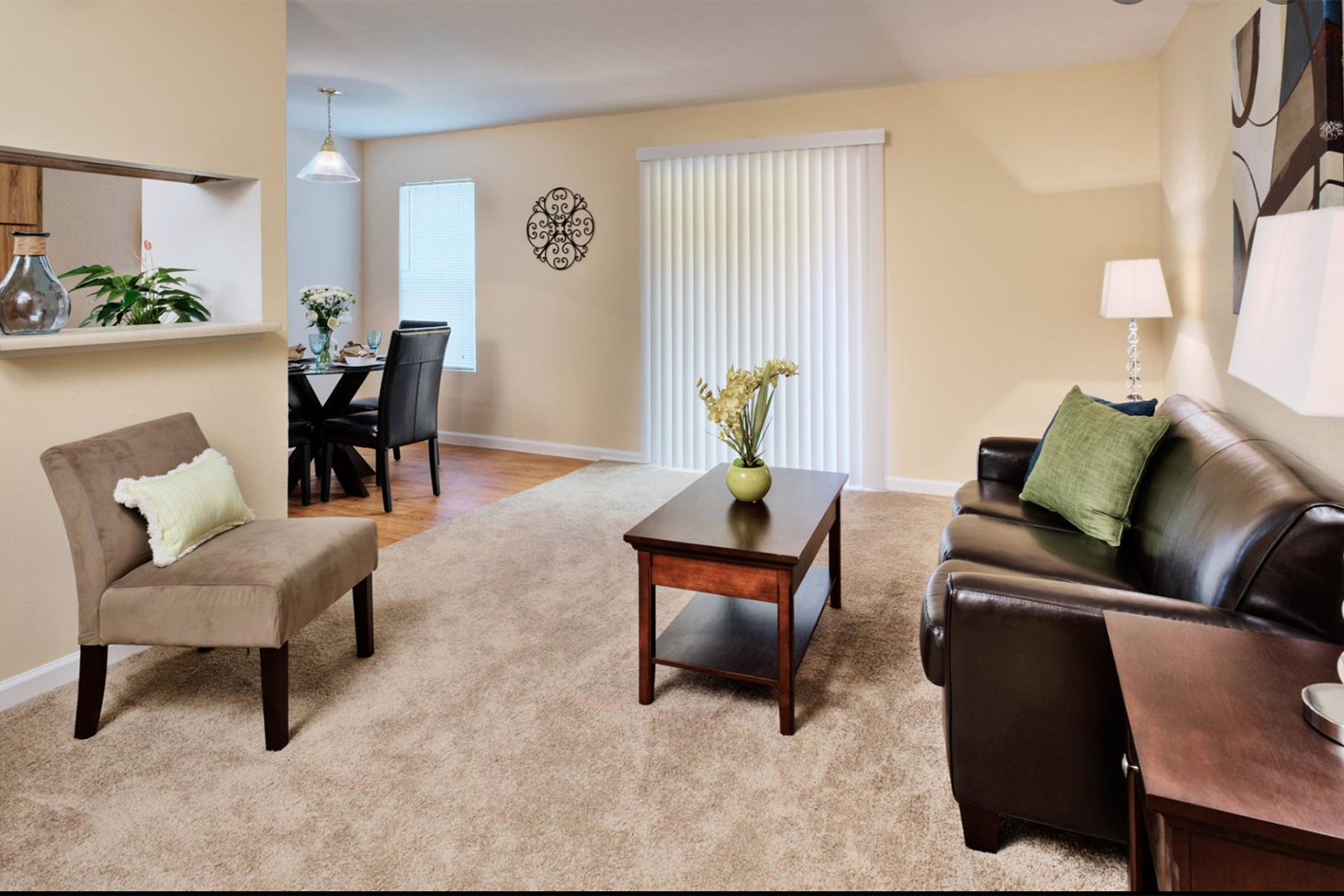 a living room with a couch and a table