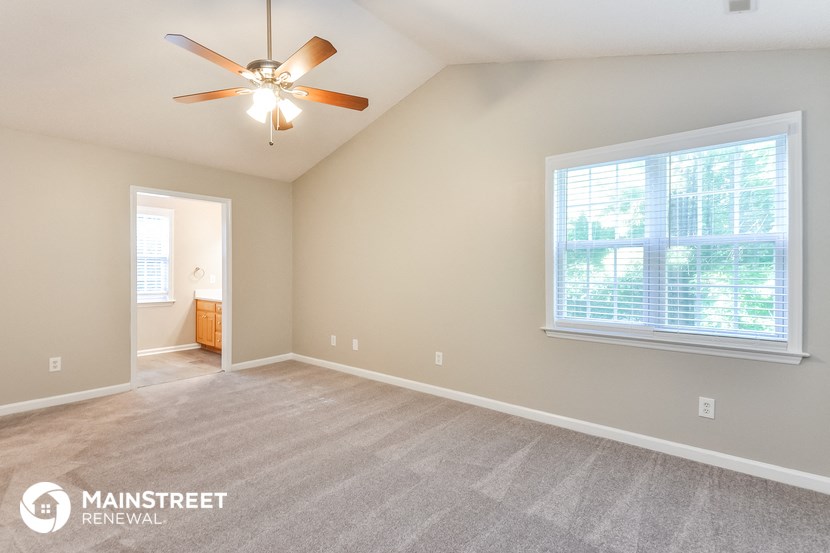 the living room and dining room are spacious and clean