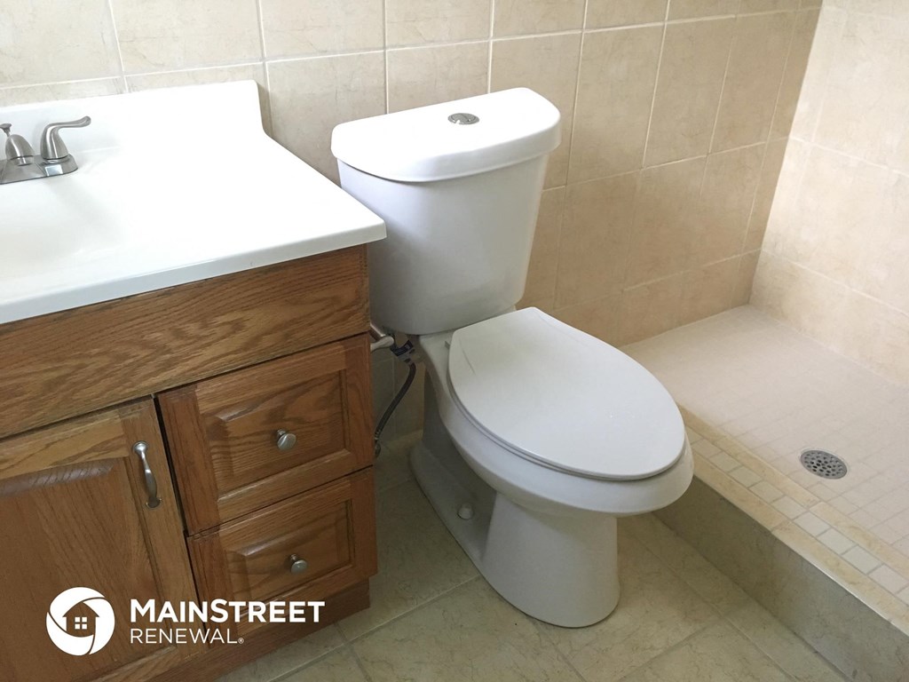 a small bathroom with a toilet and a sink