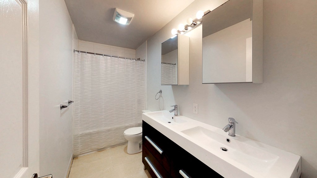 a bathroom with a sink and a toilet