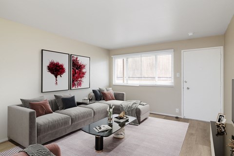 a living room with a couch and a coffee table