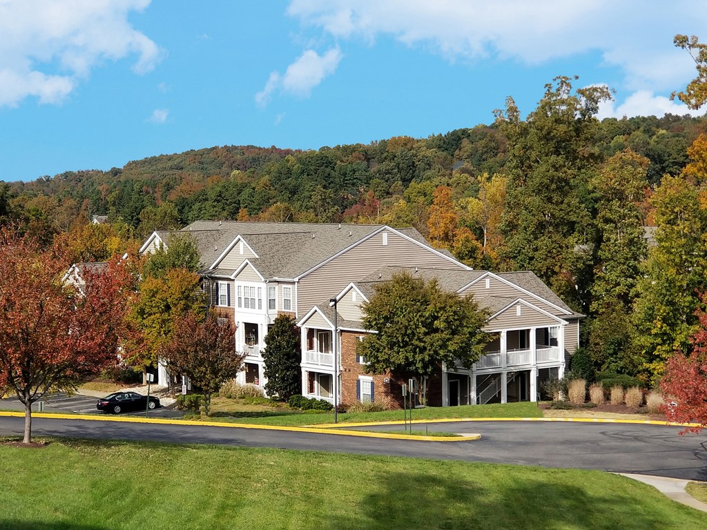 an image of a large house on the side of a road