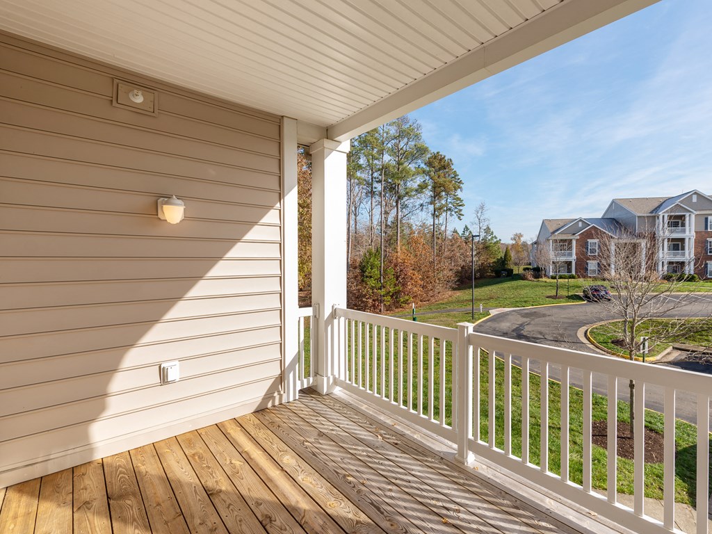 the view from the deck of a home with a porch