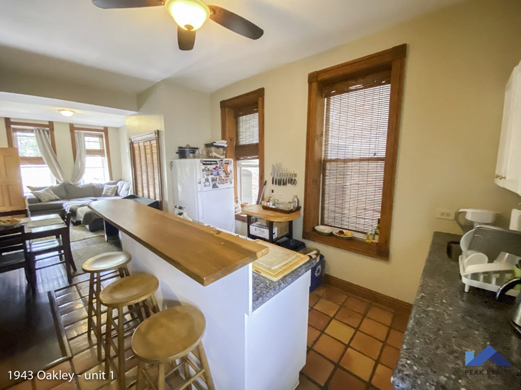 a view of the kitchen and living room from the dining room