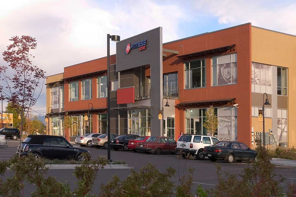 a building with cars parked in front of it