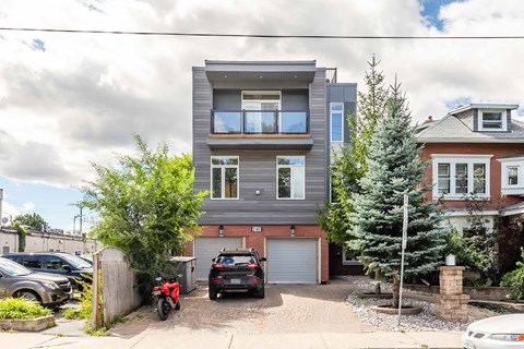 a house with a car parked in front of it