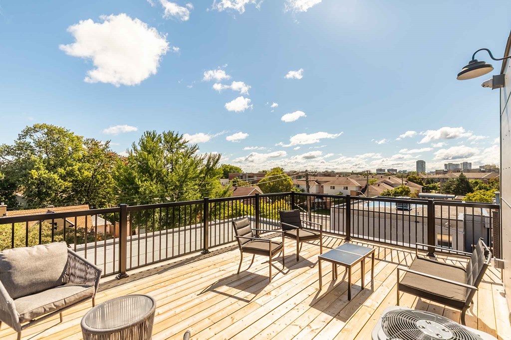 the deck has a view of the city and the sky