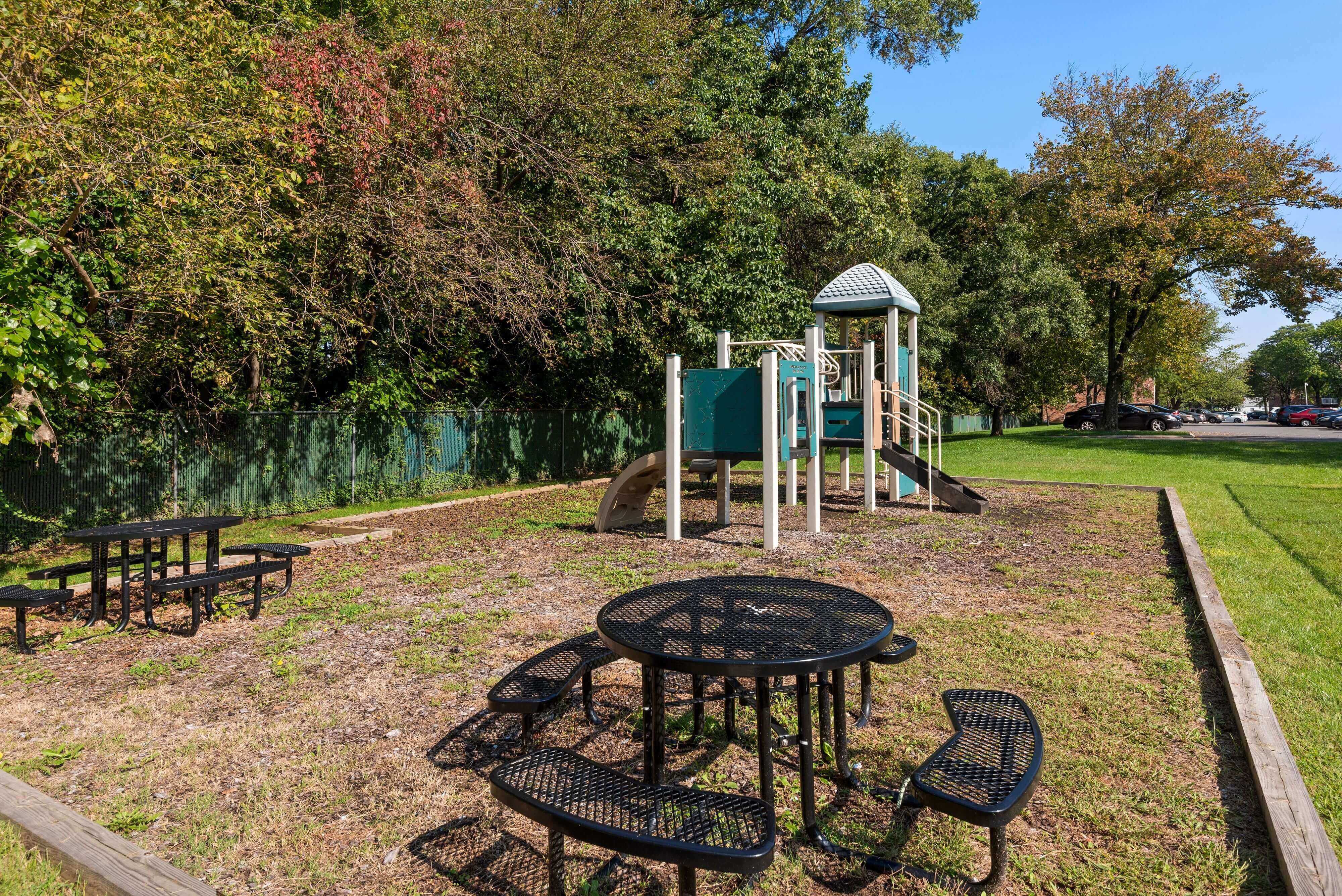 Picnic tables near a playground