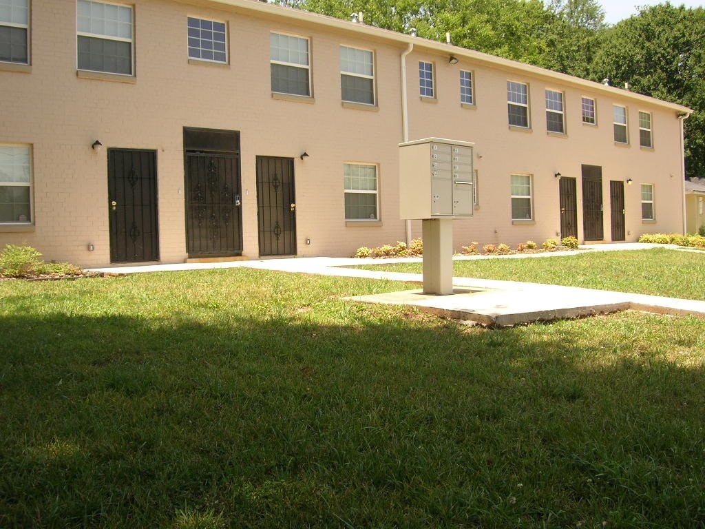 a building with a mailbox in front of it