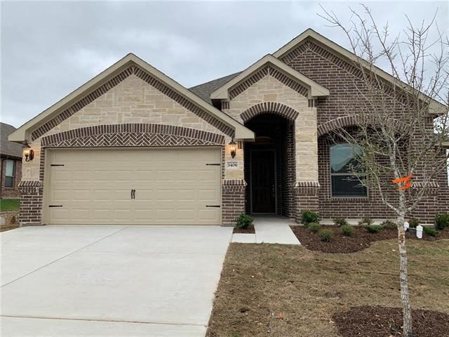 a house with a driveway and a garage door