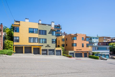 A row of colorful buildings with the number 900 on the front.