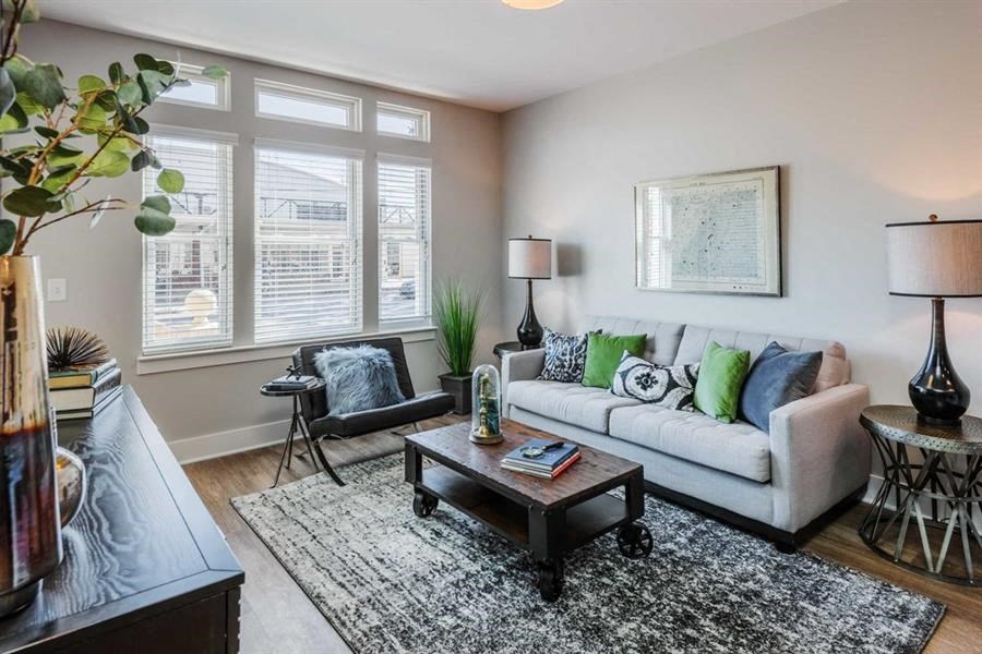 a living room with a couch and a table