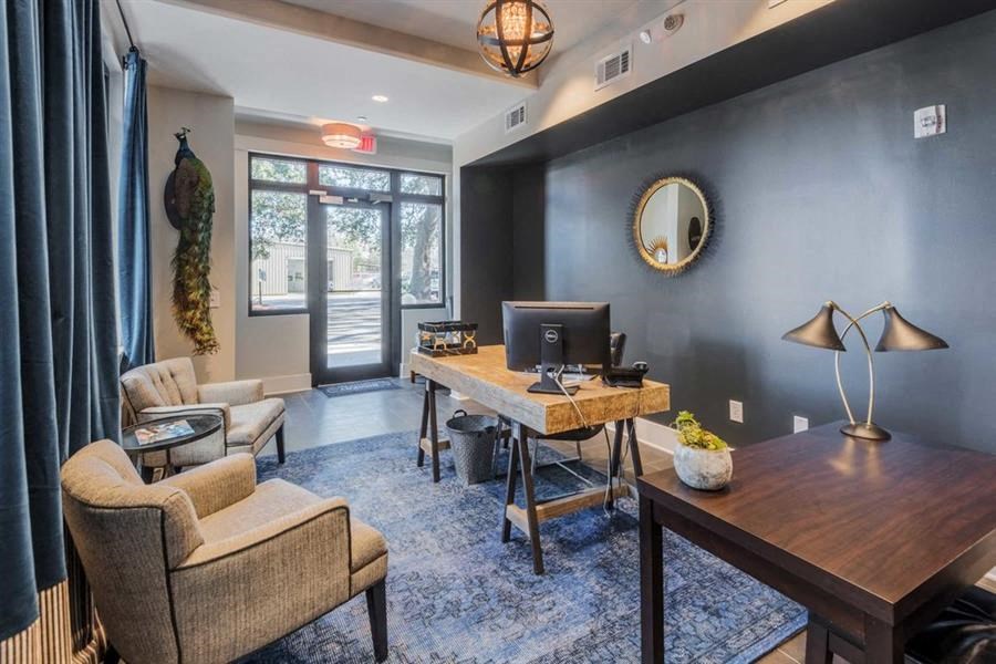 a home office with a desk and a computer