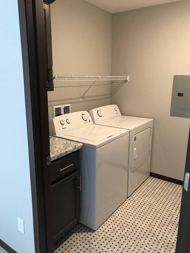 Laundry room with storage