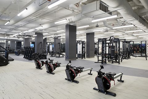 A gym with exercise bikes and other equipment.